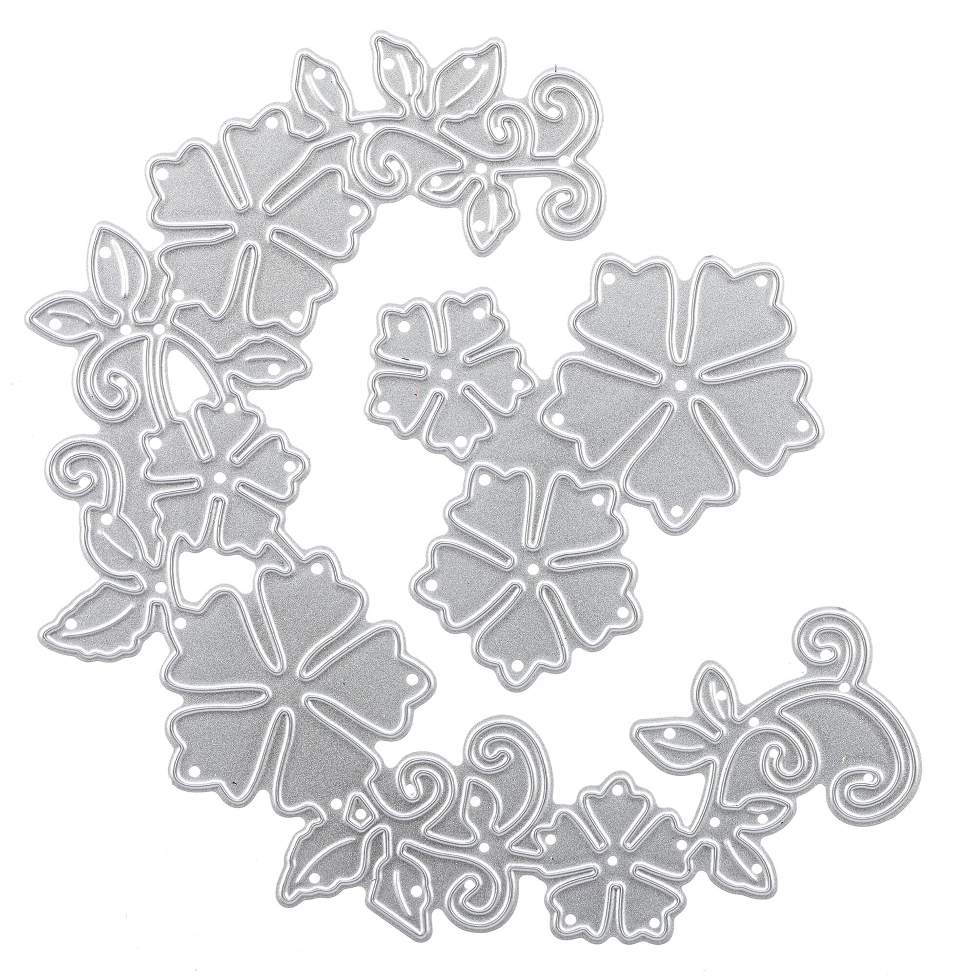 Die Stanzschablone: Blumenrand von Stanzenshop.de bietet silberne Metallstanzteile mit stilisierten Blumen und Blättern in einem geschwungenen Muster - ideal für Scrapbooking oder Bastelprojekte.