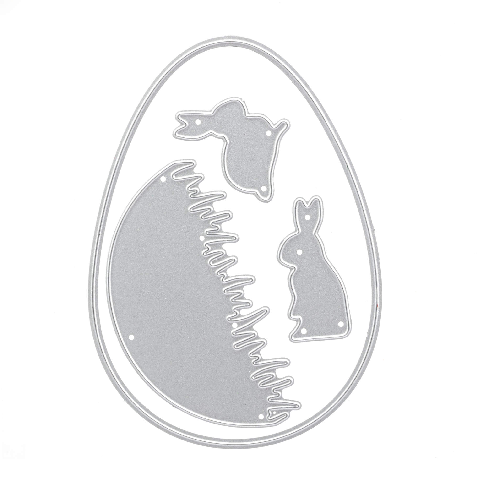Die Stanzschablone: Hasen im Gras von Stanzenshop.de ist eine gestanzte Metallschablone in Form eines Eies, mit zwei Hasensilhouetten und Gras - ideal zum Basteln und Gestalten von niedlicher Osterdeko.