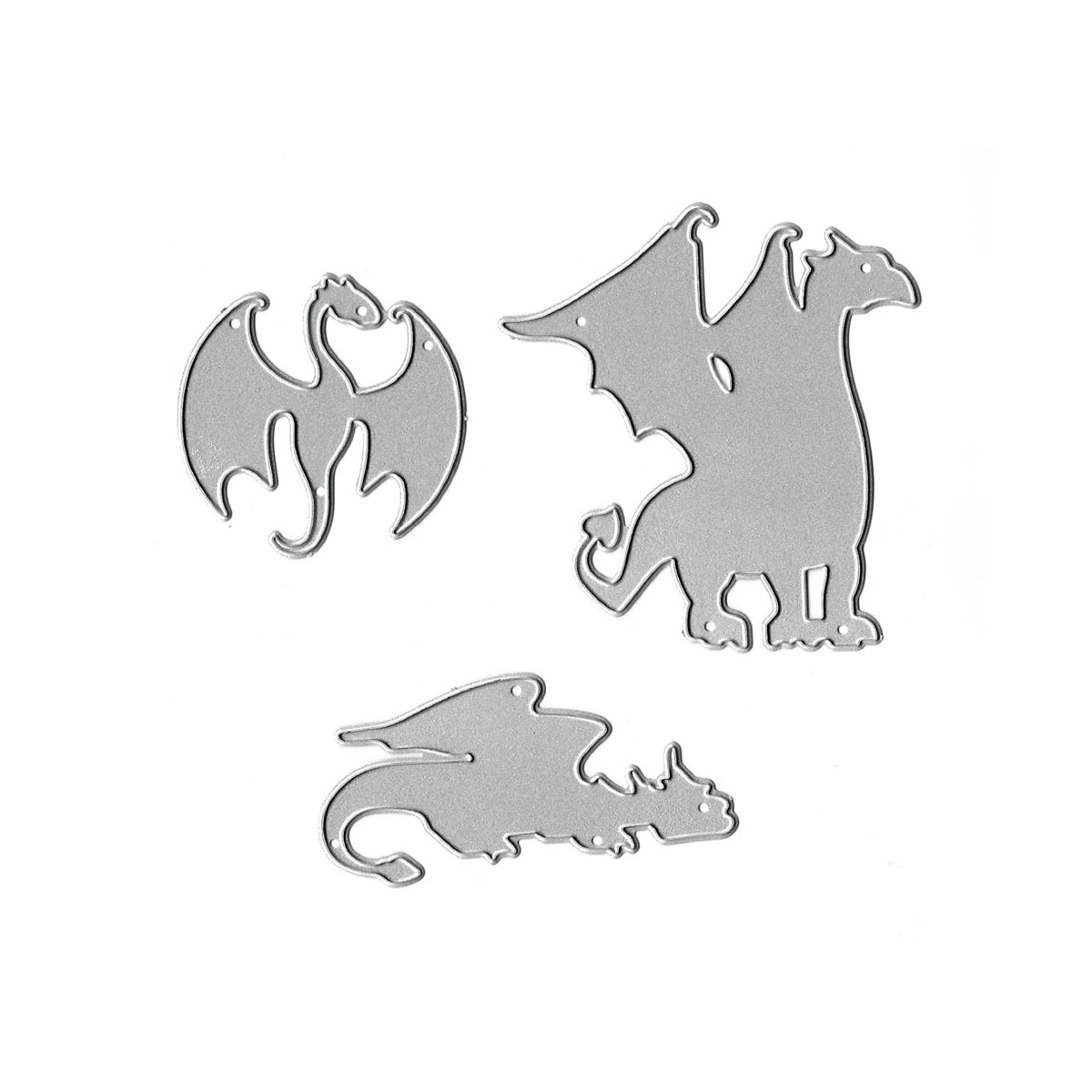 Das Stanzschablone Fantasy Drachen Set von Stanzenshop.de enthält drei silberne Drachen-Stanzformen in verschiedenen Posen - die ideale Fantasy-Dekoration mit detaillierten Drachenmotiven für jedes kreative Projekt.