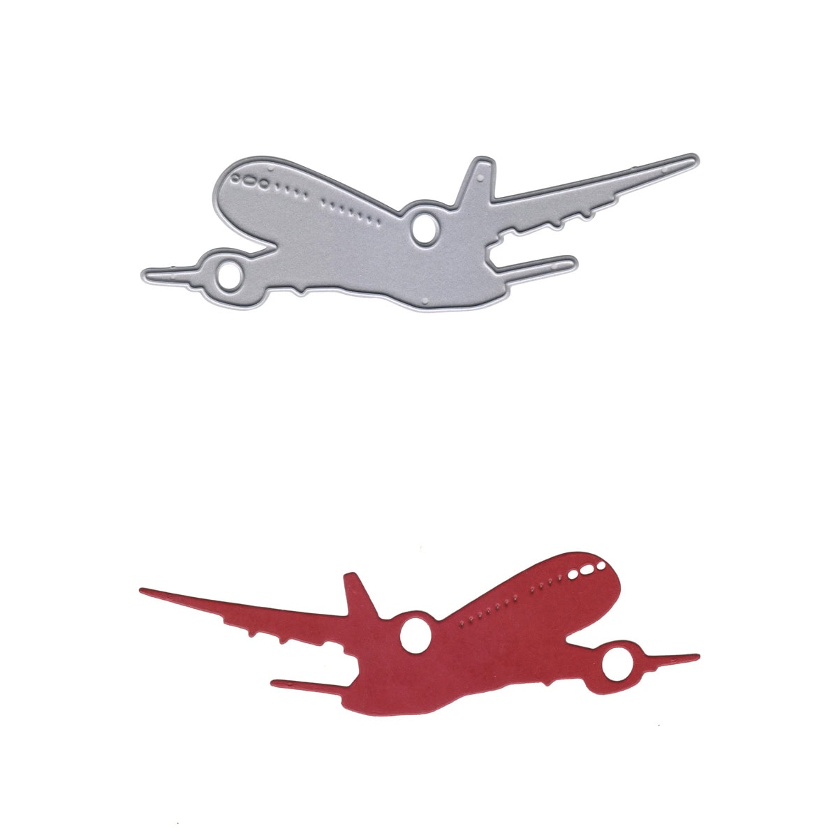 Zwei Metall-Flugzeugausschnitte, ein silberner und ein roter, sind auf weißem Hintergrund abgebildet - ideal als Stanzschablone Flugzeug von Stanzenshop.de für Reise-Bastelprojekte oder Ihr nächstes Urlaubs-Scrapbook.