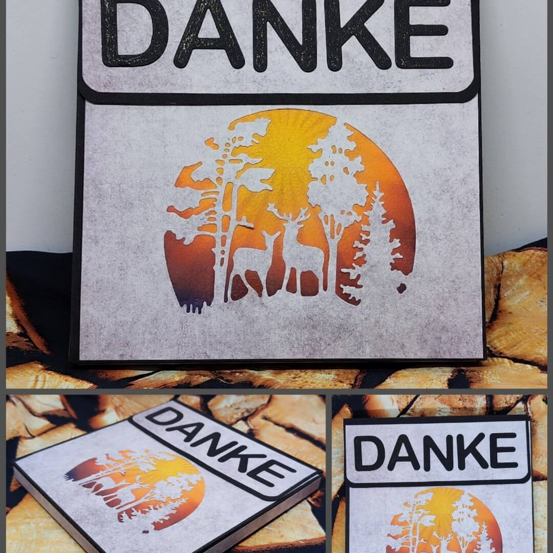 Quadratische Karte mit dem Schriftzug "DANKE" auf der Oberseite, mit einem ausgeschnittenen Baum und einem Reh, hergestellt mit der Stanzschablone von Stanzenshop.de: Winterlandschaft im Halbkreis, vor einem Hintergrund mit Sonnenuntergang. Drei Fotos zeigen die Basteln Karten aus verschiedenen Blickwinkeln.
