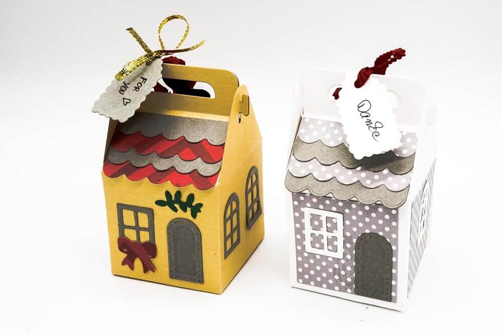 Zwei kleine Schachteln mit winterlichen Motiven darauf, perfekt zum Basteln mit einem Stanzschablone Bastelset für eine Schachtel mit winterlichen Motiven von Stanzenshop.de.
