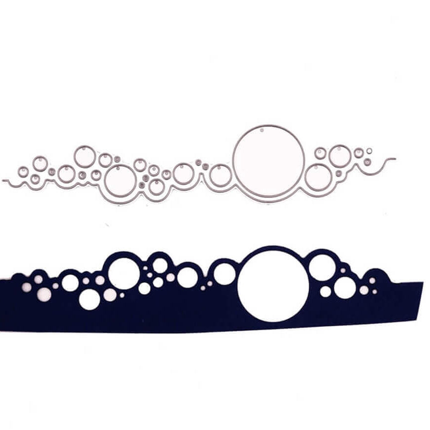 Zwei Objekte mit abwechslungsreichem Kreismuster: oben das dünne metallische Stanzschablone Band aus Kreisen von Stanzenshop.de und unten ein einfarbiger dunkler Ausschnitt, beide mit gewellten Unterkanten - ideal zum Basteln oder für Scrapbooking-Projekte.