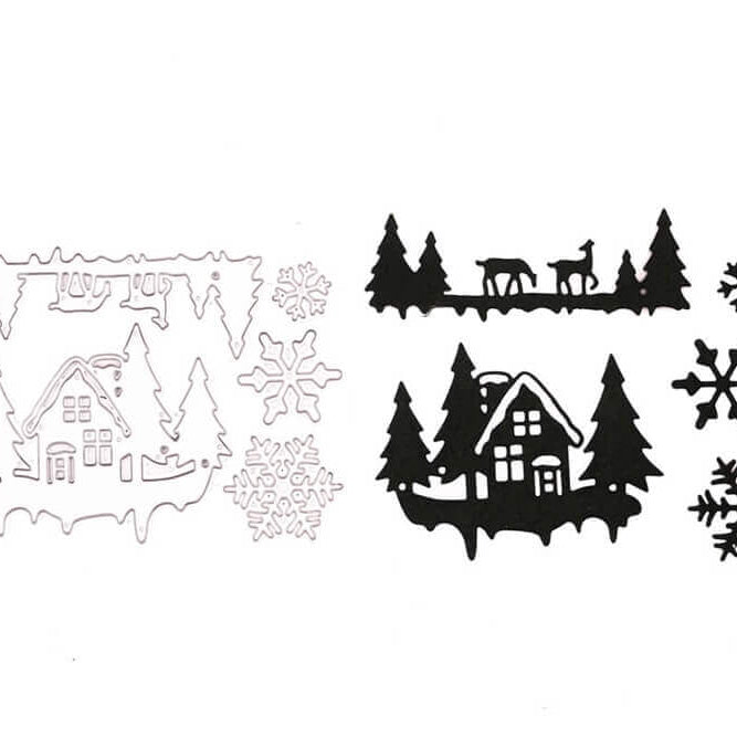 Die Stanzschablone Haus im Schnee von Stanzenshop.de und die schwarzen Papierausschnitte zeigen ein Haus, Bäume, Schneeflocken und Rehe - ideal für Scrapbooking oder Basteln, vor einem weißen Hintergrund.