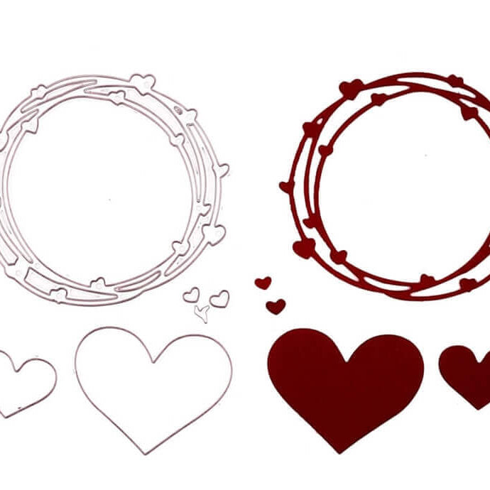 Die Stanzschablone Herzkranz von Stanzenshop.de bietet zwei Herzkranzmotive und drei Herzformen in Rot und Weiß - ideal für Scrapbooking oder als Stanzschablone Herzen für kreative Stanzen Basteln Projekte.