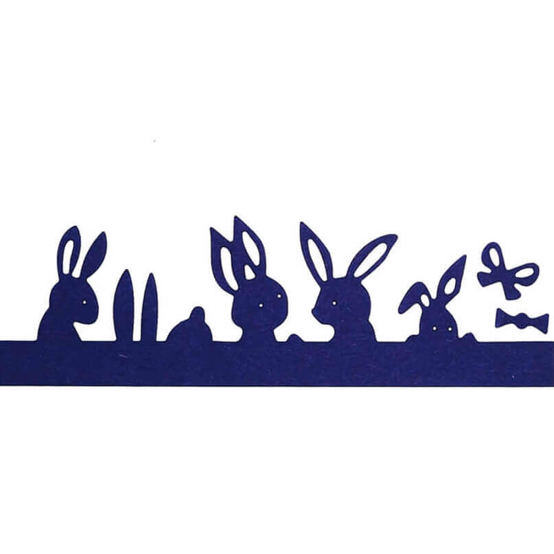 Die Stanzschablone Reihe mit Hasen und Verzierungen von Stanzenshop.de zeigt vier Hasen und zwei Schmetterlinge in kräftigem Dunkelblau - ein knackiges Design zum Basteln oder Scrapbooking, das auf weißem Hintergrund schön zur Geltung kommt.