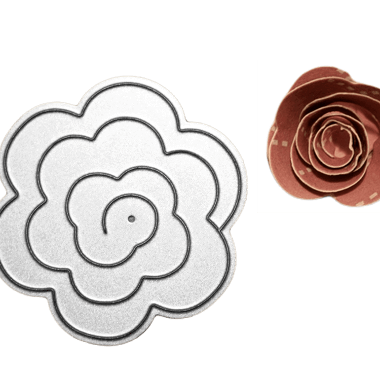 Die Stanzschablone Rosenblüte von Stanzenshop.de und die dazu passende braune Papierblume werden Seite an Seite präsentiert - ideal, um Ihren Scrapbooking-Projekten ein kreatives Flair zu verleihen.