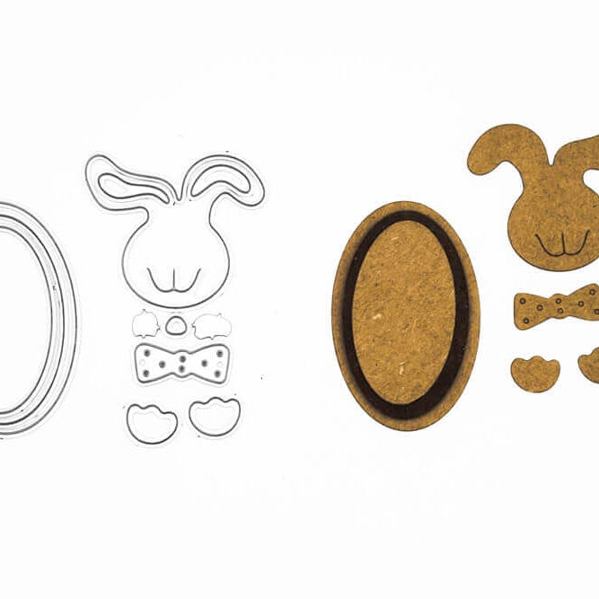 Stanzschablone: Süßer Osterhase von Stanzenshop.de bietet Metall- und Korkhasen und ovale Ausschnitte, die wunderschön auf Weiß arrangiert sind - ideal für Basteln Ostern Projekte mit Ihren Lieblings-Osterformen.