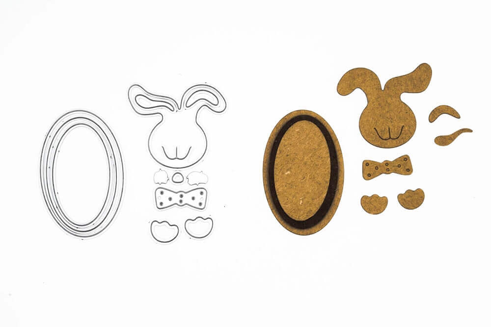 Stanzschablone: Süßer Osterhase von Stanzenshop.de bietet Metall- und Korkhasen und ovale Ausschnitte, die wunderschön auf Weiß arrangiert sind - ideal für Basteln Ostern Projekte mit Ihren Lieblings-Osterformen.