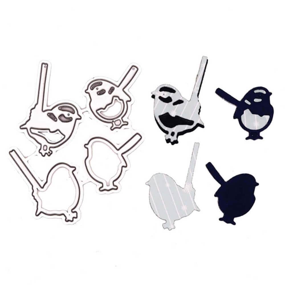 Die Stanzschablone Vier Spatzen von Stanzenshop.de bietet Spatzen-Stanzformen aus Metall mit passenden dunkelblauen und weißen Papierausschnitten, dargestellt auf weißem Hintergrund - ideal für Scrapbooking- oder Bastelprojekte.