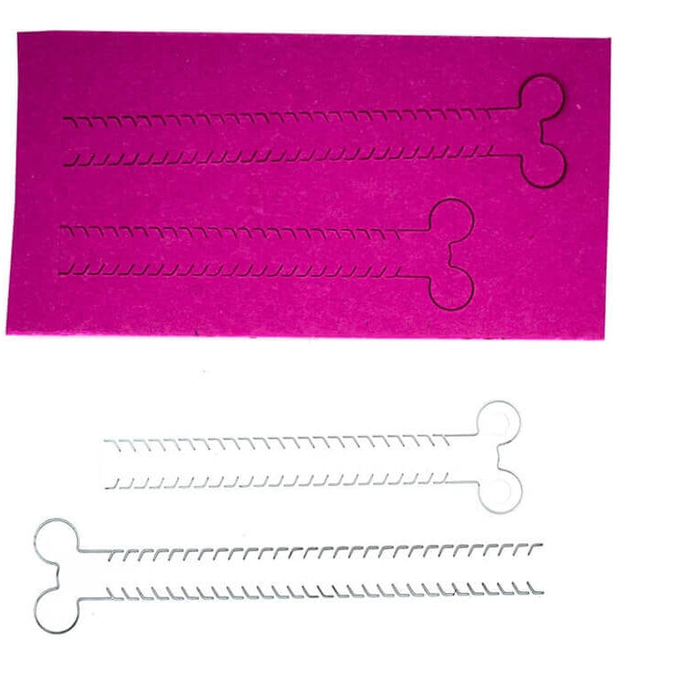 Ein magentafarbenes Papier zeigt zwei knochenförmige Ausschnitte, die mit der Stanzenshop.de Stanzschablone Zwei Reißverschlüsse für Gutscheine hergestellt wurden; die abgetrennten Stücke weisen gezackte Kanten auf - ideal für Bastelprojekte und den kreativen Einsatz.