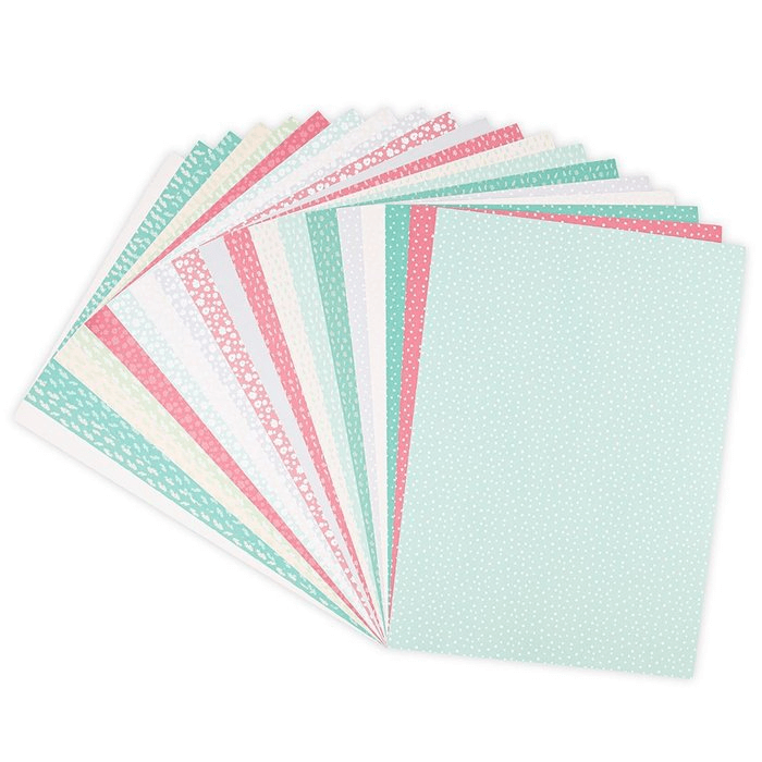 Ein Stapel Sizzix • Surfacez Musterpapier A4 Botanical 60 Blatt Papiere mit einem farbenfrohen Muster in Rosa, Grün und Blau.