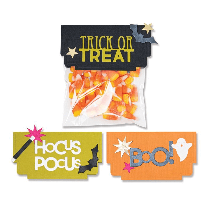 Die Sizzix 665951 - Thinlits Halloween Toppers von Sizzix enthalten drei dekorierte Süßigkeitentüten-Topper - "TRICK OR TREAT", "Hocus Pocus" und "Boo!" - mit Fledermaus- und Geistermotiven; eine davon fasst 13 Candy Corns. Maße auf Anfrage erhältlich.