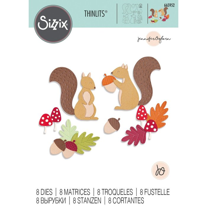 Die Verpackung der Sizzix 665952 Thinlits Harvest Squirrels (6,5 x 2,8 cm) zeigt zwei Eichhörnchen, Pilze, Eicheln und Blätter aus geschnittenem Papier sowie das Markenzeichen von Sizzix und Produktdetails.