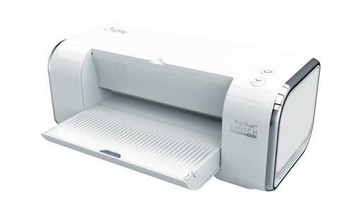 Eine weiße elektronische Schneidemaschine mit einem offenen Fach und zwei Tasten oben, die zum Schneiden von Materialien für Bastel- und Heimwerkerprojekte entwickelt wurde.