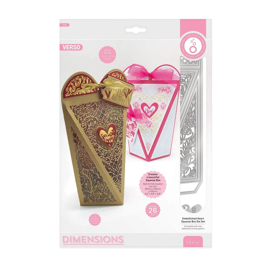 Ein rosa-goldenes Tonic Studios • Dimensions Stanzset. Verzierte Quetschbox mit einem Herzen darauf, perfekt für Partys oder Scrapbooking.