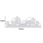 Die "Stanzschablone: Kleinstadt mit Bäumen" von Stanzenshop.de ist eine silberne Metallstanze mit Häusern, Bäumen, Auto und Büschen (4,6 cm x 15,1 cm); perfekt für Scrapbooking- oder Bastelprojekte.