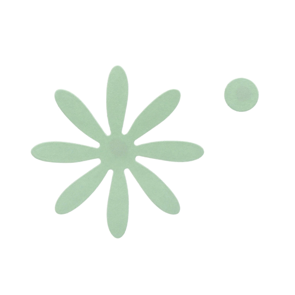 Abstrakte Illustration einer hellgrünen Stanzschablone: Blumenblüte von Stanzenshop.de mit einem separaten kleinen Kreis, der an ein einfaches Gänseblümchen und eine einzelne Pollenperle erinnert.