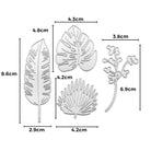 Vier Stanzschablone Grünpflanzen Metallstanzen von Stanzenshop.de, ideal für Scrapbooking. Größte Stanze: 8,6 x 2,9cm; andere von 6,9 bis 4,2cm breit; perfekte Grünpflanzen-Akzente für kreative Projekte und Basteln.