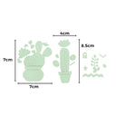 Das Bild zeigt das Stanzschablone Kakteenset von Stanzenshop.de, bestehend aus grünen Kaktusausschnitten in den Größen 7x7 cm und 4x8,5 cm sowie kleinen Verzierungen - ideal für Scrapbooking oder als Kakteen Stanzschablone auf weißem Hintergrund.