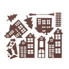 Die Stanzschablone Fünf verschiedene Häuser mit Zubehör von Stanzenshop.de zeigt braune Papierausschnitte von Häusern, Bäumen, einem Zaun, Stechpalmenblättern und einem Pfeil - ideal für Scrapbooking- oder Bastelprojekte.