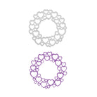 Die Stanzschablone Kreis aus Herzen von Stanzenshop.de zeigt zwei ineinandergreifende Herzkreise - einen silbernen und einen lila - ideal für Scrapbooking oder als einzigartiges Stanzmuster.