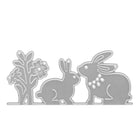 Die Stanzschablone "Zwei Hasen und eine Blume" von Stanzenshop.de zeigt eine gestanzte Silhouette von zwei Hasen und einer Blume - ideal zum Basteln oder für kreative Osterstanzen.