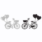 Die "Stanzschablone Fahrrad mit Luftballons" von Stanzenshop.de zeigt zwei Fahrradsilhouetten, eine silberne und eine schwarze, jeweils mit einem Korb und drei Herzluftballons - ideal für Scrapbooking oder Bastelprojekte.