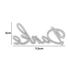 Die Stanzschablone "Schriftzug Danke" von Stanzenshop.de ist ein silberner Metallstempel in Schreibschrift, ideal für Dankeskarten gestalten. Abmessungen: 3 cm x 7,2 cm.