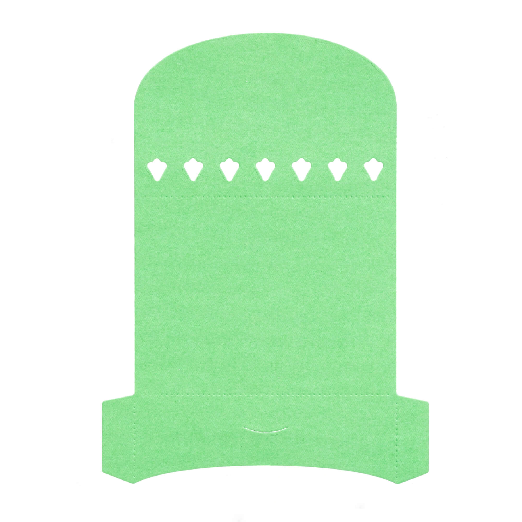 Der grüne "Stanzschablone: Umschlag mit Baum" von Stanzenshop.de hat ein rundes Top, geraden Boden und sieben kleine weiße Cutouts in einer Reihe - ideal für kreative Umschläge.