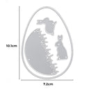 Die Stanzschablone: Hasen im Gras von Stanzenshop.de ist eine Metallstanze in Eiform (10,1 x 7,2 cm) mit zwei Hasen- und Grassilhouetten - perfekt zum Basteln oder als niedliche Osterdeko.