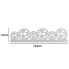 Die Stanzenshop.de Stanzschablone: Fußballreihe ist eine 3,3 cm x 13,5 cm große Metallic-Stanzform mit einem Halbkreismuster aus geometrischen Fußbällen - ideal für Scrapbooking oder die Gestaltung einzigartiger Karten.