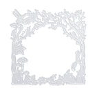Die "Stanzschablone: Herbstwald" von Stanzenshop.de ist eine Metallstanzform mit einem quadratischen Waldmotiv mit Bäumen, Pilzen, Vögeln und einem Hasen - ideal für Bastelprojekte mit herbstlichen Motiven.
