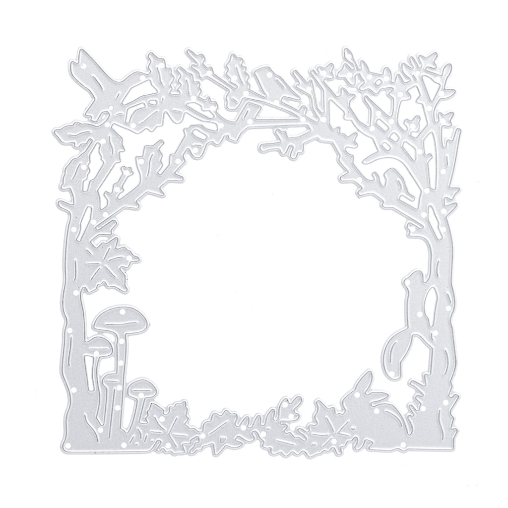 Eine metallische Stanzschablone von Stanzenshop.de mit einem Herbstwald-Rahmendesign, das Bäume, Blätter, Pilze und einen Vogel umfasst.