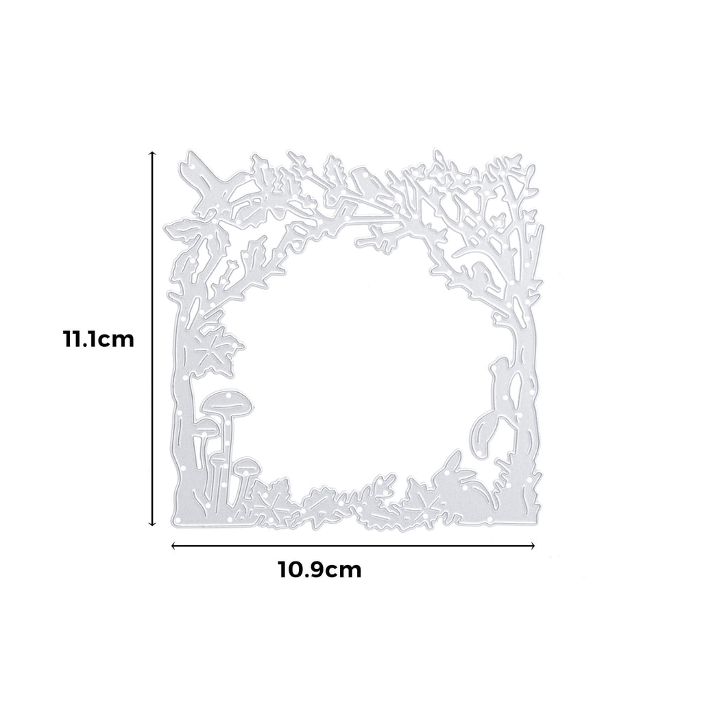 Ein weißer Rahmen mit einem Motiv aus Bäumen und Vögeln, perfekt für Bastelprojekte oder als herbstliche Meisterwerke, mit der Stanzschablone: Herbstwald von Stanzenshop.de.