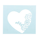 Hellblaue rechteckige Karte mit einer großen Stanzenshop.de Stanzschablone: 3D Herzausschnitt in der Mitte, der ein detailliertes Rosenmuster zeigt - ideal für Bastelprojekte und handgemachte Karten.