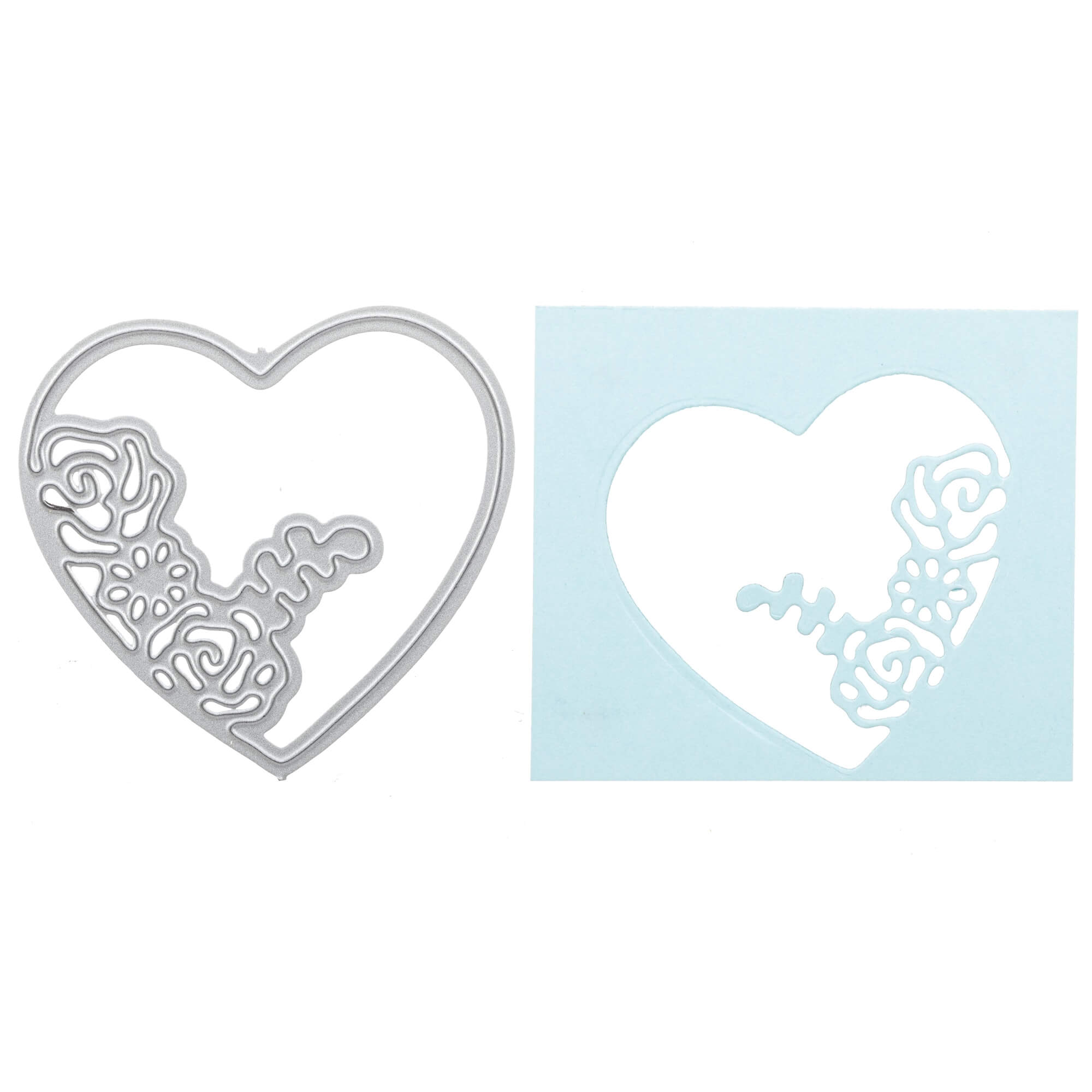 Die Stanzschablone: 3D Herz von Stanzenshop.de aus Metall mit floralen Details liegt neben blauem Papier mit Herz-Cutout - ideal für handgemachte Karten und kreative Bastelideen.