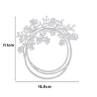 Die "Stanzschablone: Ring mit Blumen" von Stanzenshop.de ist eine silberne Metallschablone mit einem kreisrunden Blütenzweig-Design, ideal für Schmuck selber machen. Größe: 11,1 x 10,9 cm.