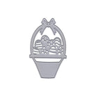 Der Stanzschablone Osterkorb mit Schleife von Stanzenshop.de zeigt einen Osterkorb mit Eiern und Schleife - perfekt für Bastelprojekte oder kreative Ostergrüße. Produktabbildung auf weißem Hintergrund.