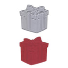Zwei Stanzschablonen Geschenk mit Schleife von Stanzenshop.de - eine silberne und eine rote Geschenkbox, jeweils mit einer Schleife versehen - stehen nebeneinander auf weißem Hintergrund, ideal für Bastelprojekte oder kreative Dekoideen.