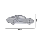 Die Stanzschablone Sportwagen von Stanzenshop.de ist ein silberner Autowürfel (9,1 cm x 3 cm), ideal für kreative Autofans oder als Sportwagen-Akzent auf dem Basteltisch, dargestellt auf weißem Hintergrund.