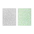 Zwei rechteckige Platten - eine graue, eine hellgrüne - zeigen verstreute weiße Sterne in verschiedenen Größen, ideal für Ihr nächstes Scrapbooking-Projekt oder kreative Ergebnisse mit der Stanzschablone: Platte mit Sternen von Stanzenshop.de.