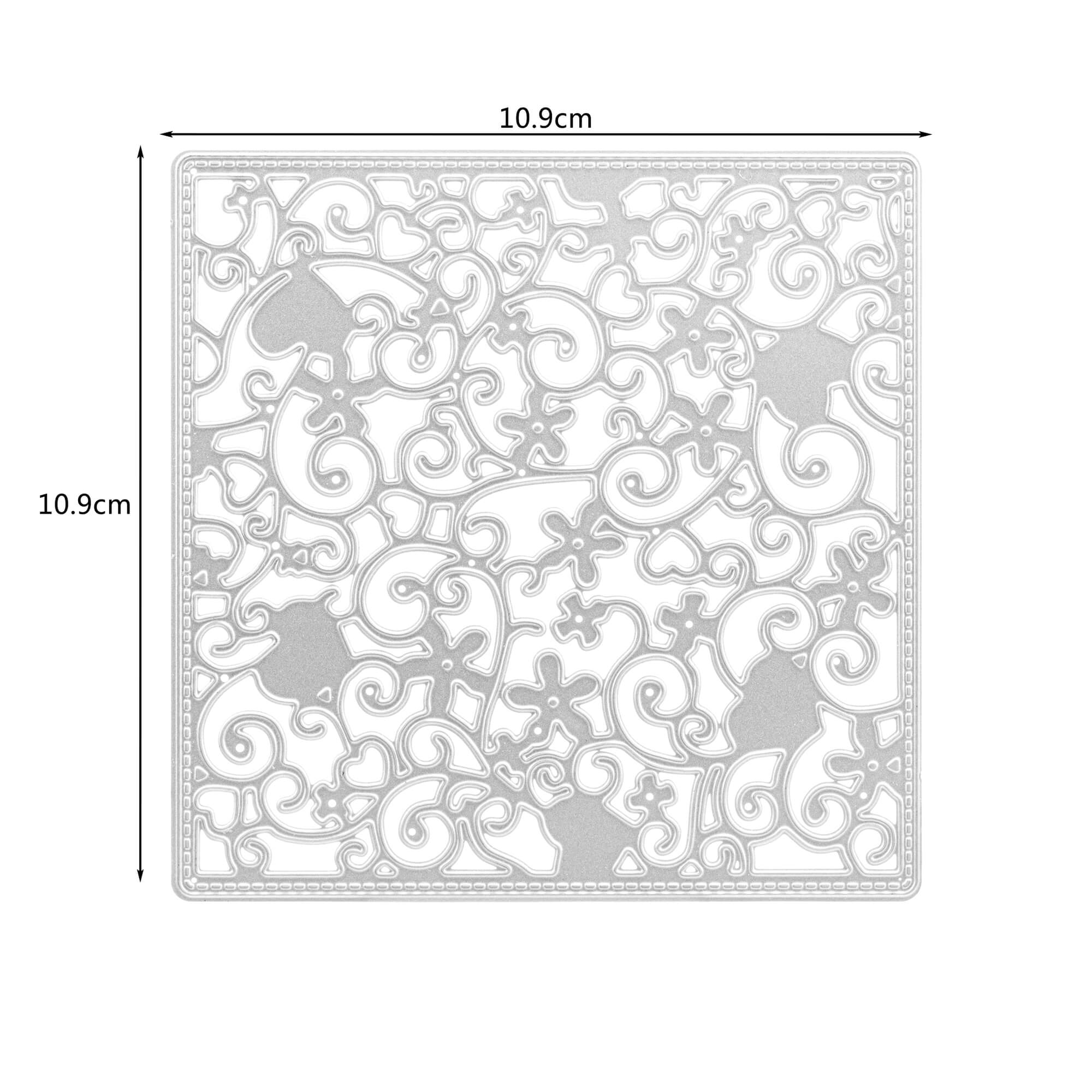 Die Stanzschablone Platte mit Blumen und Herzen von Stanzenshop.de ist eine quadratische silberne Metallschablone (10,9 x 10,9 cm) mit einem verschlungenen Blumen- und Herzmuster, ideal für Scrapbooking oder Bastelprojekte.