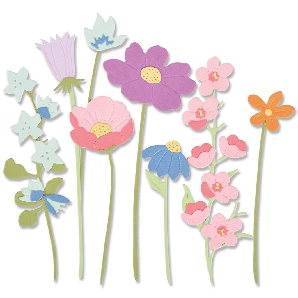Eine atemberaubende Auswahl an Papierblumen in einem Regenbogen leuchtender Farben, darunter Sizzix • Thinlits Stanzformen-Set „In the Meadow“ von Alexis Trimble, präzise gefertigt mit Stanzformen.