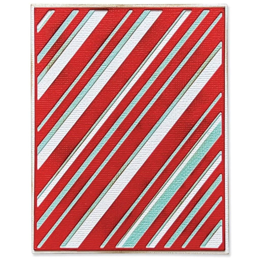 Eine Weihnachtskarte mit roten und türkisfarbenen Streifen, erstellt mit Sizzix Thinlits Stanzschablonen Layered Stripes.