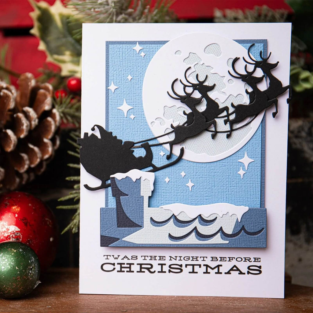 Eine Weihnachtskarte mit dem Weihnachtsmann auf einem Rentierschlitten von Sizzix Thinlits Stanzschablonen.