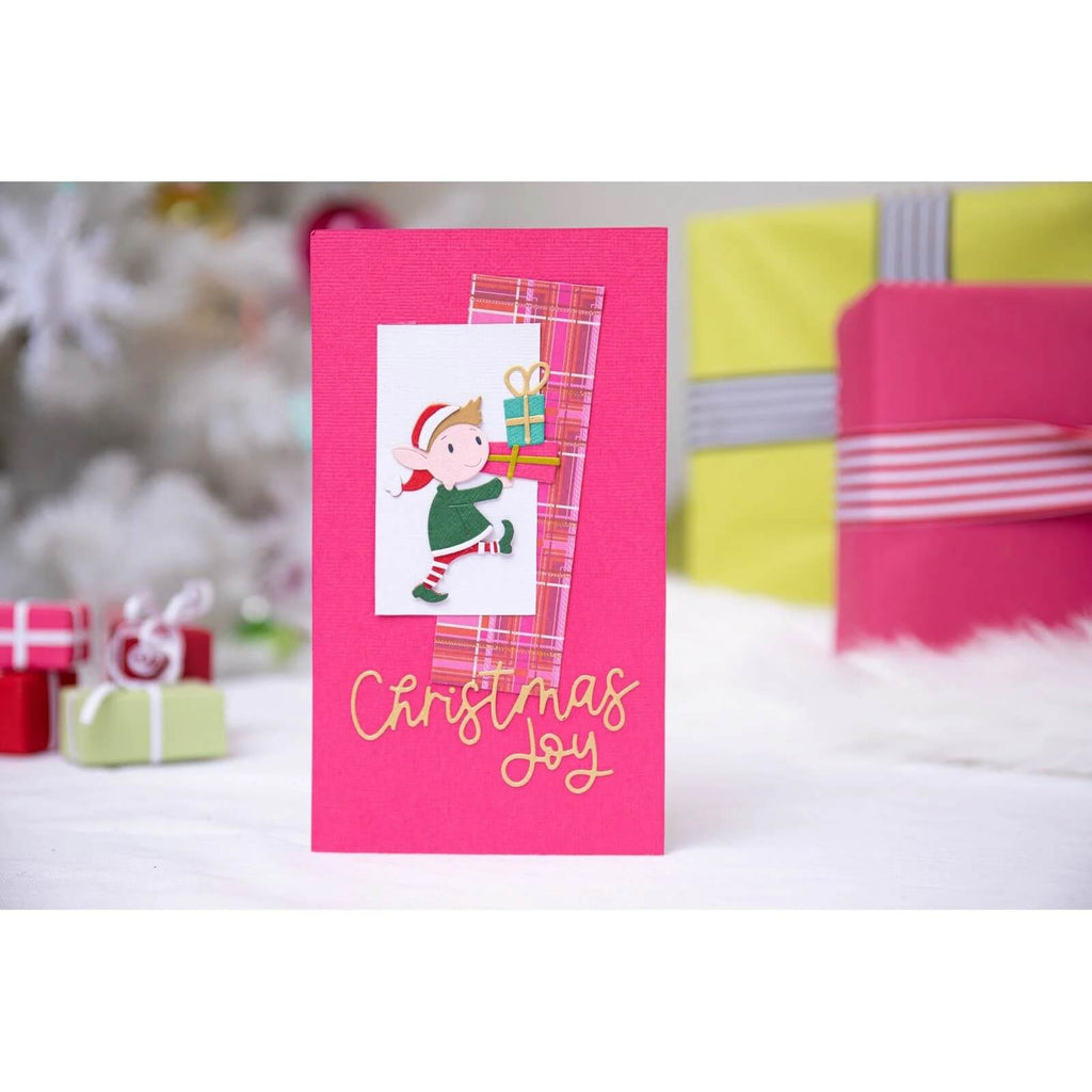 Eine Sizzix-Weihnachtskarte mit dem Bild eines Elfen.