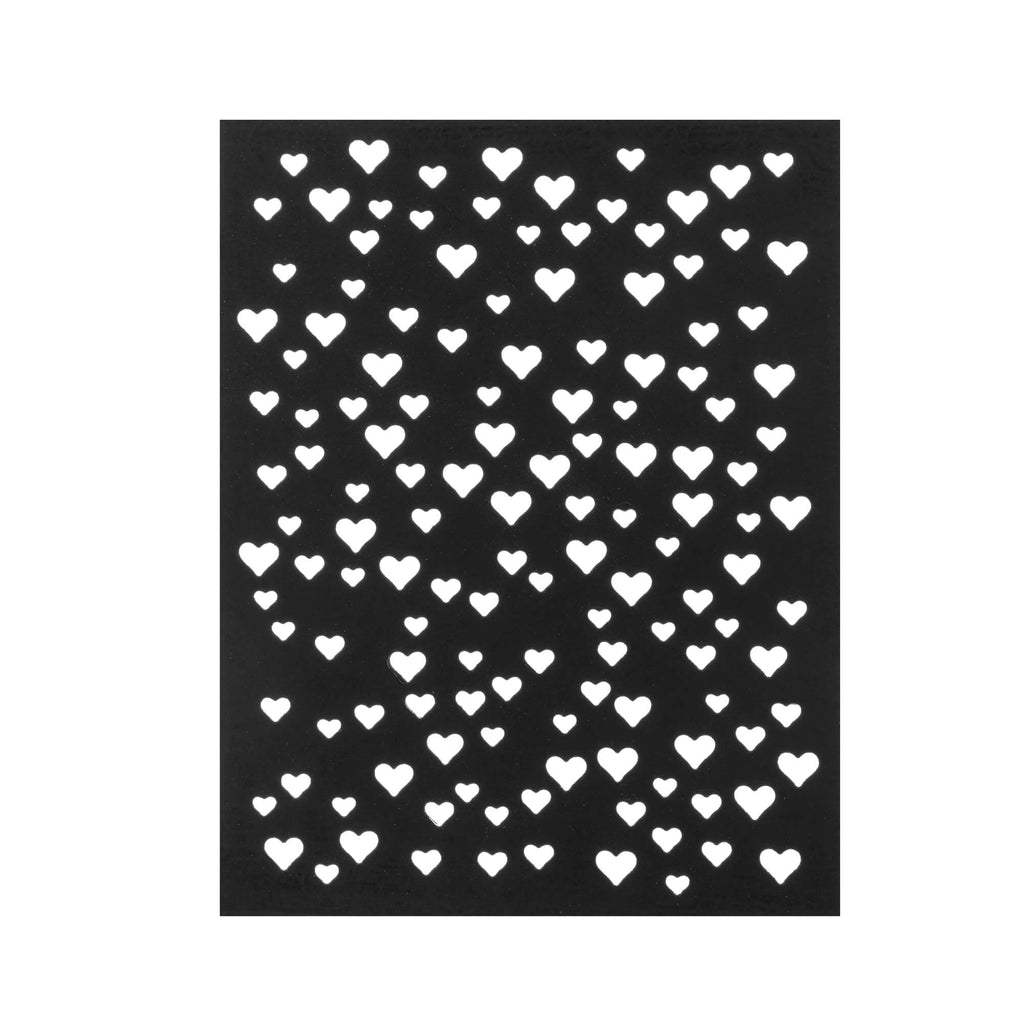 Mit der Stanzschablone Platte mit Herzen von Stanzenshop.de entsteht ein schwarzer Hintergrund mit weißen Herzen darauf. Der Hintergrund wertet das Gesamtdesign auf.