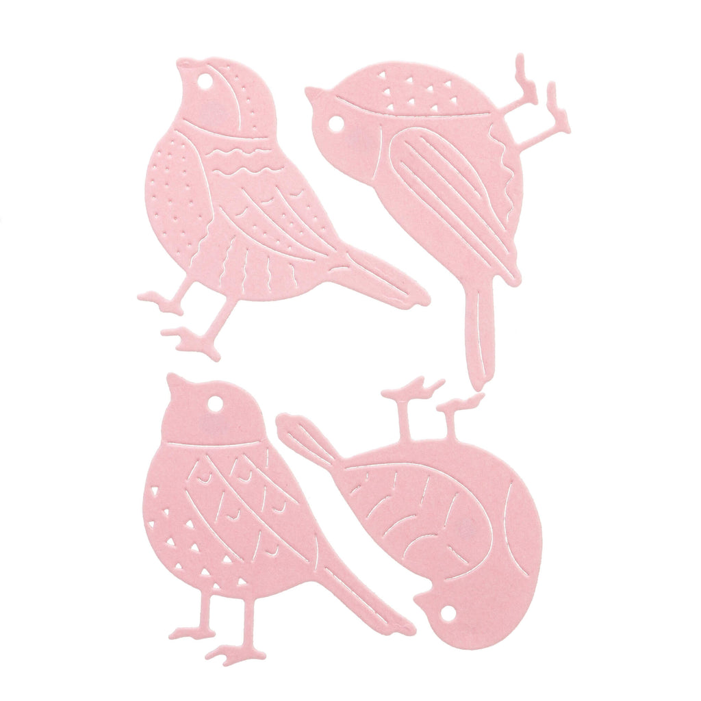 Ein Satz rosa Vögel auf weißem Hintergrund, erstellt mit der Stanzschablone Vier verschiedene Vögel von Stanzenshop.de.