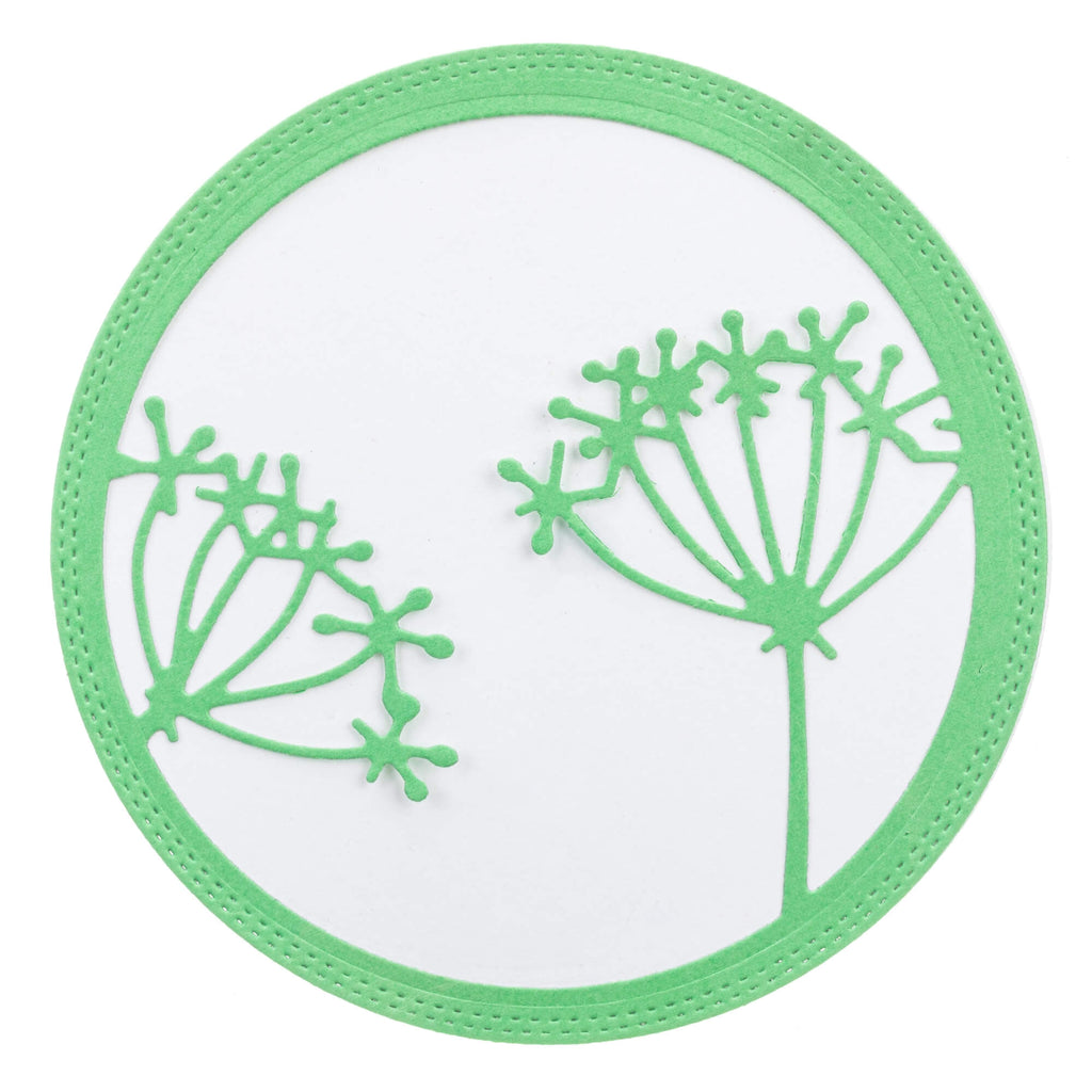 Eine kostengünstige Stanzschablone mit einem grünen Kreis und zwei Pusteblumen in einem runden Rahmen (Marke: Stanzenshop.de).